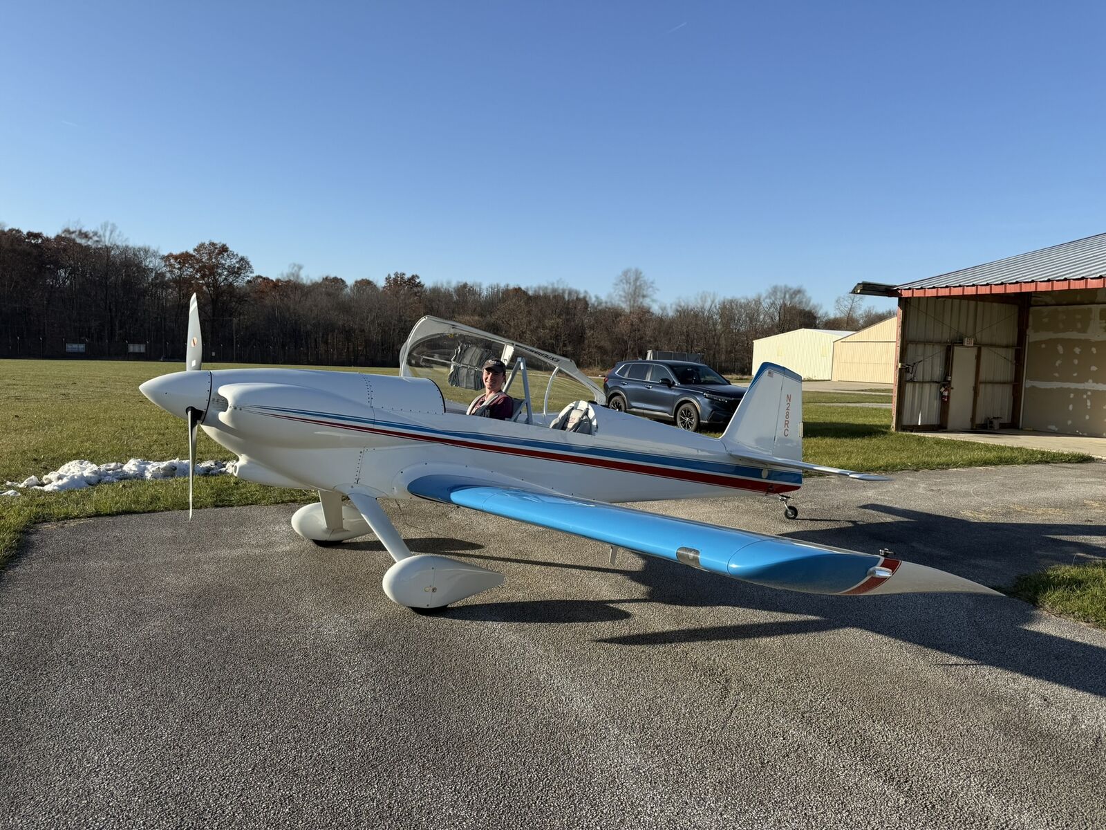 A Vans RV experimental aircraft parked on the Michigan City ramp.